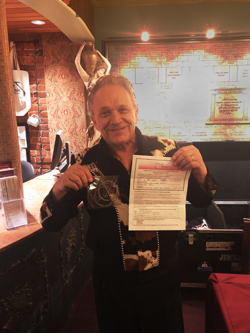 Jimmie Vaughan donates his brothers played guitar strings